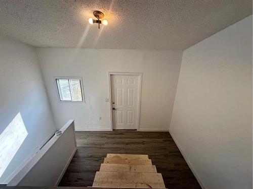 1921 21 Street, Nanton, AB - Indoor Photo Showing Other Room