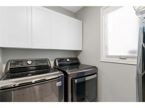 36 Tuscany Hills Close Nw, Calgary, AB - Indoor Photo Showing Laundry Room