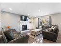 36 Tuscany Hills Close Nw, Calgary, AB  - Indoor Photo Showing Living Room With Fireplace 