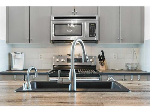 236 Copperstone Cove Se, Calgary, AB - Indoor Photo Showing Kitchen With Double Sink With Upgraded Kitchen