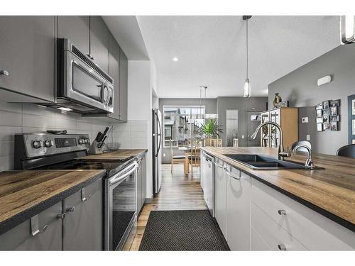 236 Copperstone Cove Se, Calgary, AB - Indoor Photo Showing Kitchen With Double Sink With Upgraded Kitchen