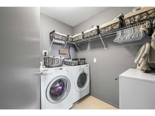 236 Copperstone Cove Se, Calgary, AB - Indoor Photo Showing Laundry Room