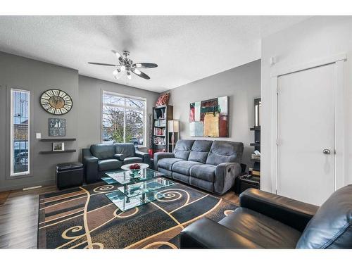 236 Copperstone Cove Se, Calgary, AB - Indoor Photo Showing Living Room