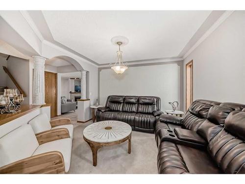 26 Arbour Butte Road Nw, Calgary, AB - Indoor Photo Showing Living Room