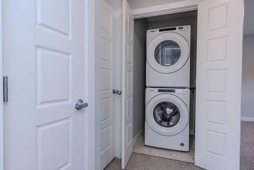 8 Legacy Glen Link, Calgary, AB - Indoor Photo Showing Laundry Room