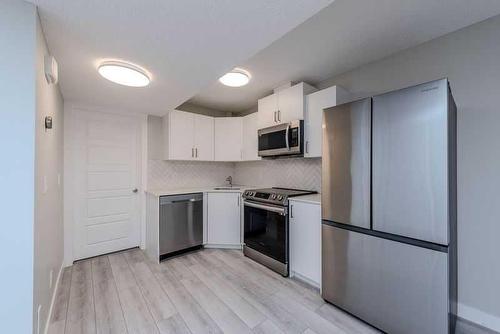 8 Legacy Glen Link, Calgary, AB - Indoor Photo Showing Kitchen With Stainless Steel Kitchen