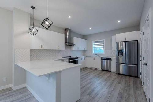 8 Legacy Glen Link, Calgary, AB - Indoor Photo Showing Kitchen With Stainless Steel Kitchen With Upgraded Kitchen