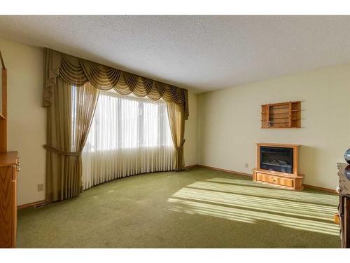 3935 Brooklyn Crescent Nw, Calgary, AB - Indoor With Fireplace