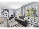 3108 39 Street Se, Calgary, AB  - Indoor Photo Showing Living Room 