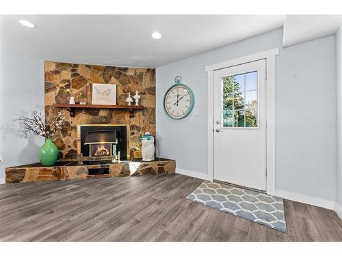 3108 39 Street Se, Calgary, AB - Indoor Photo Showing Living Room With Fireplace