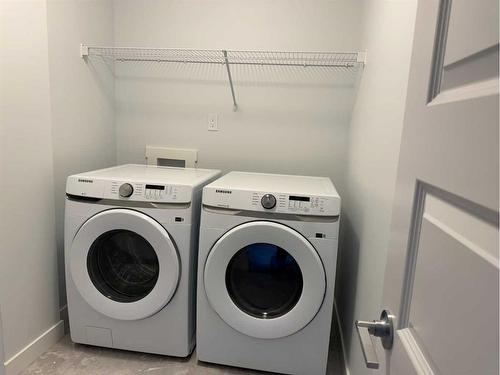 834 Bayview Terrace Sw, Airdrie, AB - Indoor Photo Showing Laundry Room