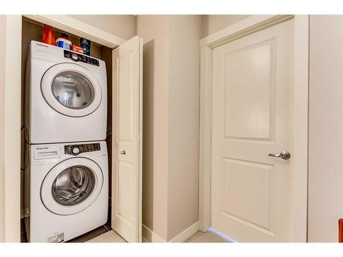 34 Aspen Hills Green Sw, Calgary, AB - Indoor Photo Showing Laundry Room