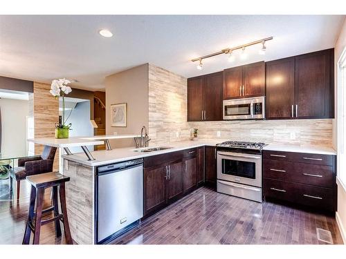 34 Aspen Hills Green Sw, Calgary, AB - Indoor Photo Showing Kitchen With Stainless Steel Kitchen With Double Sink With Upgraded Kitchen