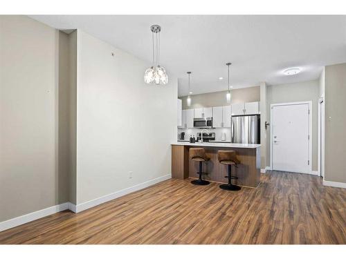 401-10 Auburn Bay Link Se, Calgary, AB - Indoor Photo Showing Kitchen With Upgraded Kitchen