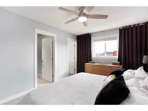 106-800 Yankee Valley Boulevard Se, Airdrie, AB - Indoor Photo Showing Bedroom