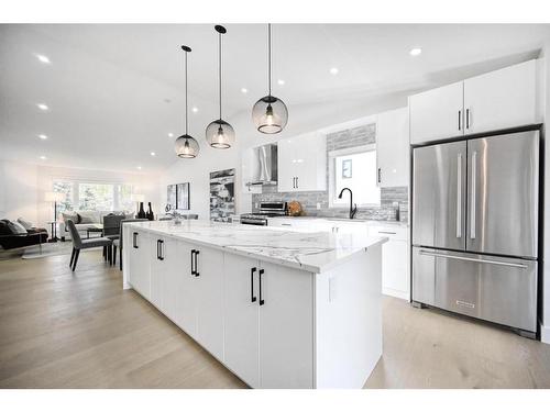 941 West Chestermere Drive, Chestermere, AB - Indoor Photo Showing Kitchen With Upgraded Kitchen