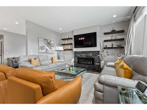 56 Legacy Bay Se, Calgary, AB - Indoor Photo Showing Living Room With Fireplace