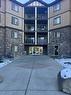 2318-60 Panatella Street Nw, Calgary, AB  - Outdoor With Balcony With Facade 