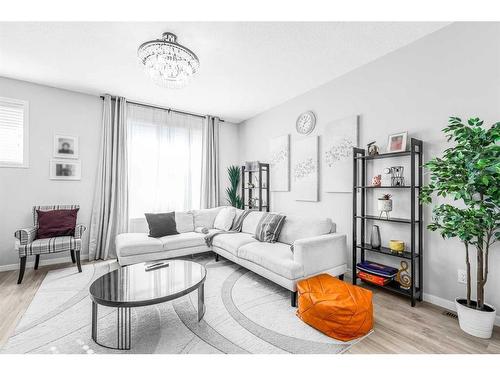 307 Copperstone Manor Se, Calgary, AB - Indoor Photo Showing Living Room