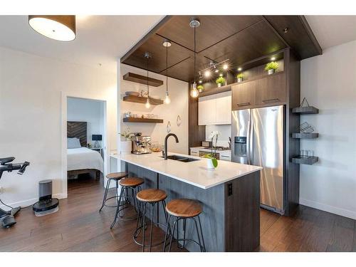 302-2702 17 Avenue Sw, Calgary, AB - Indoor Photo Showing Kitchen With Stainless Steel Kitchen With Double Sink With Upgraded Kitchen