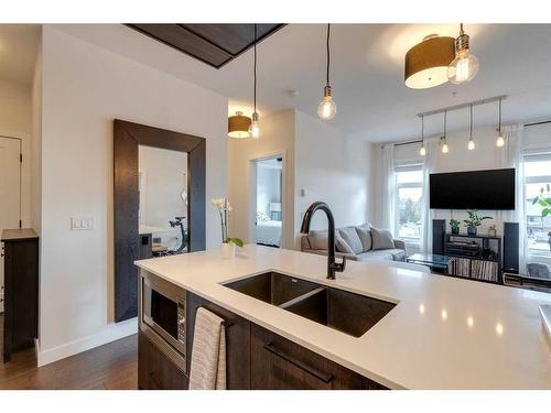 302-2702 17 Avenue Sw, Calgary, AB - Indoor Photo Showing Kitchen With Double Sink