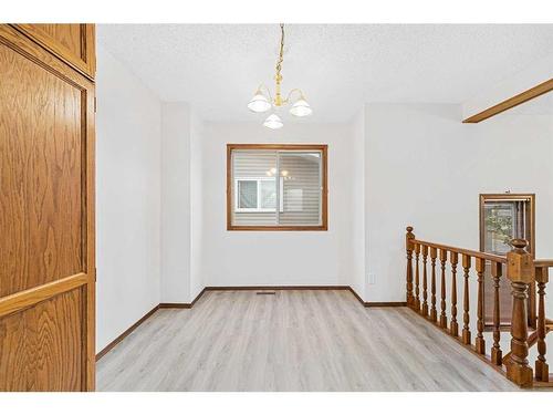 211 Sandstone Drive Nw, Calgary, AB - Indoor Photo Showing Other Room