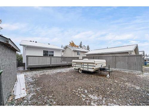 211 Sandstone Drive Nw, Calgary, AB - Outdoor With Deck Patio Veranda