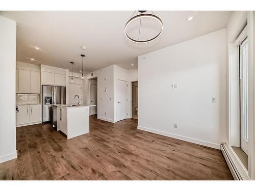 3405-111 Wolf Creek Drive Se, Calgary, AB - Indoor Photo Showing Kitchen