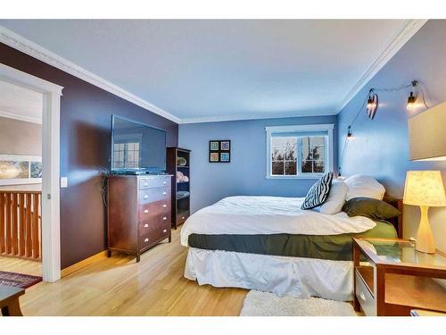 99 Coral Springs Boulevard Ne, Calgary, AB - Indoor Photo Showing Bedroom