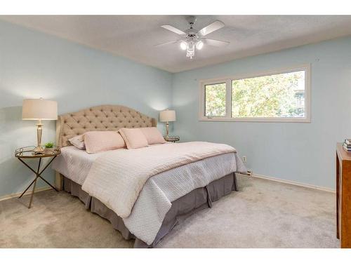 16 Capri Avenue Nw, Calgary, AB - Indoor Photo Showing Bedroom