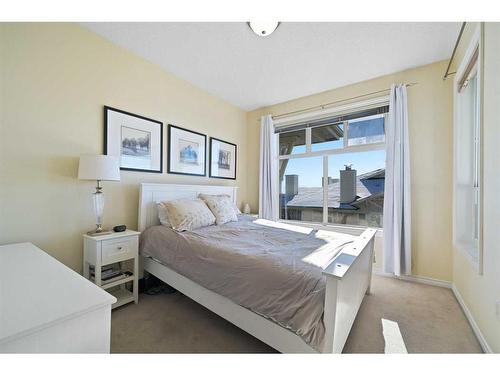 1310-1010 Arbour Lake Road Nw, Calgary, AB - Indoor Photo Showing Bedroom