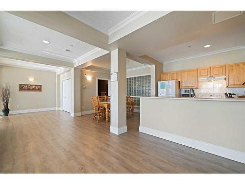 1310-1010 Arbour Lake Road Nw, Calgary, AB - Indoor Photo Showing Kitchen