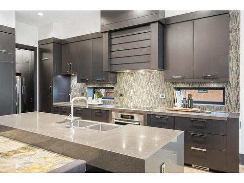 58 Posthill Drive Sw, Calgary, AB - Indoor Photo Showing Kitchen With Double Sink With Upgraded Kitchen