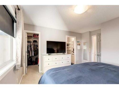 1233 New Brighton Drive Se, Calgary, AB - Indoor Photo Showing Bedroom