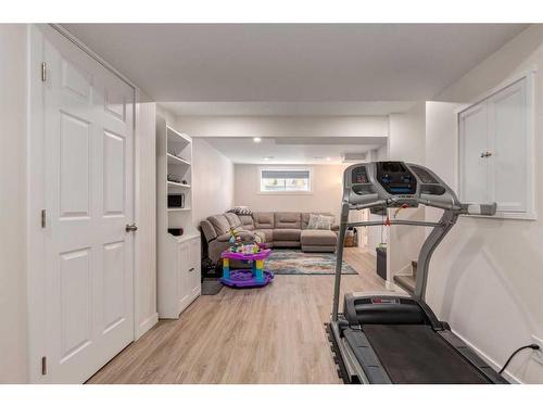 1233 New Brighton Drive Se, Calgary, AB - Indoor Photo Showing Gym Room