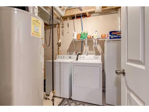 1233 New Brighton Drive Se, Calgary, AB - Indoor Photo Showing Laundry Room