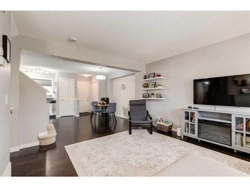 1233 New Brighton Drive Se, Calgary, AB - Indoor Photo Showing Living Room