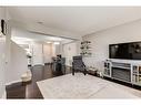 1233 New Brighton Drive Se, Calgary, AB  - Indoor Photo Showing Living Room 