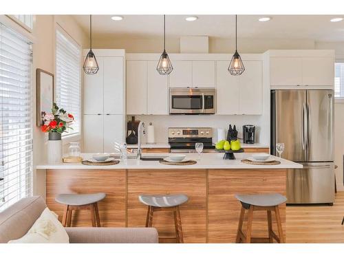 911-10060 46 Street Ne, Calgary, AB - Indoor Photo Showing Kitchen With Stainless Steel Kitchen