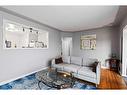 5607 Thorndale Place Nw, Calgary, AB  - Indoor Photo Showing Living Room 