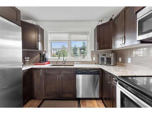 427 Covecreek Circle Ne, Calgary, AB - Indoor Photo Showing Kitchen With Stainless Steel Kitchen