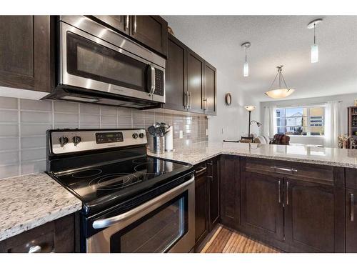 427 Covecreek Circle Ne, Calgary, AB - Indoor Photo Showing Kitchen With Upgraded Kitchen