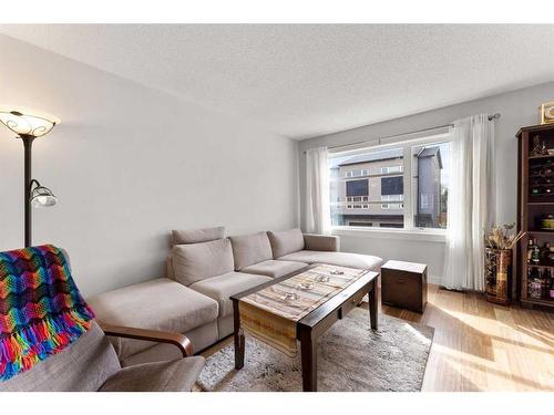 427 Covecreek Circle Ne, Calgary, AB - Indoor Photo Showing Living Room