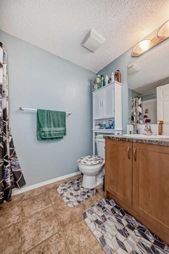 2105-700 Willowbrook Road Nw, Airdrie, AB - Indoor Photo Showing Bathroom