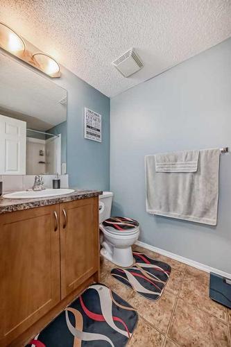 2105-700 Willowbrook Road Nw, Airdrie, AB - Indoor Photo Showing Bathroom