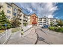 2105-700 Willowbrook Road Nw, Airdrie, AB  - Outdoor With Balcony With Facade 