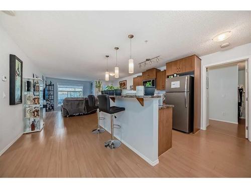 2105-700 Willowbrook Road Nw, Airdrie, AB - Indoor Photo Showing Kitchen