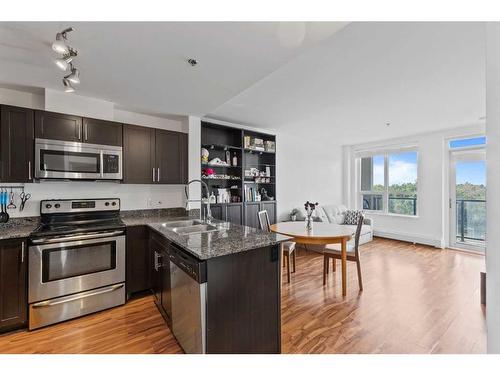 522-955 Mcpherson Road Ne, Calgary, AB - Indoor Photo Showing Kitchen With Stainless Steel Kitchen With Double Sink