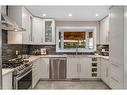 363 Acadia Drive Se, Calgary, AB  - Indoor Photo Showing Kitchen With Upgraded Kitchen 