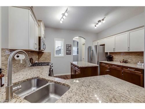 2587 Reunion Square Nw, Airdrie, AB - Indoor Photo Showing Kitchen With Double Sink